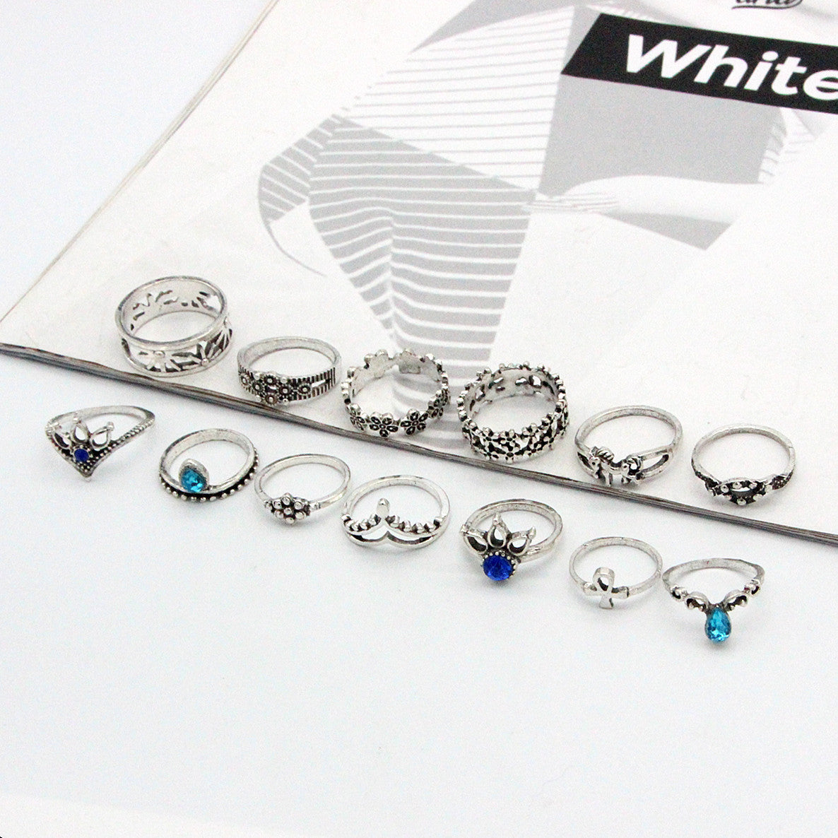 European And American Retro Water Drop Pony Hollow Jeweled Ring Suit