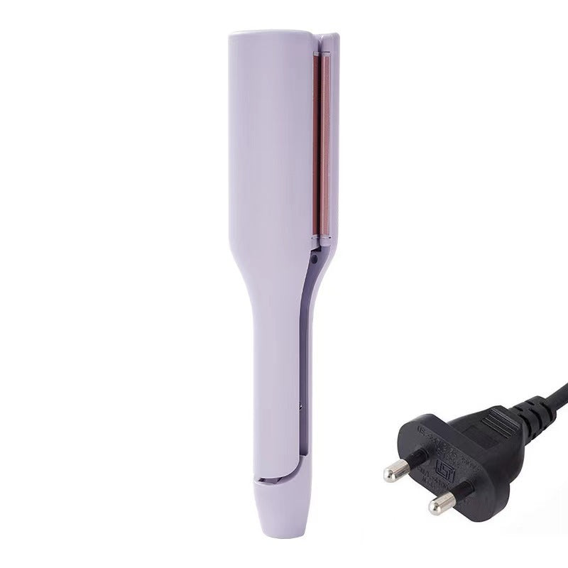 Hair straightener with plug on a white background