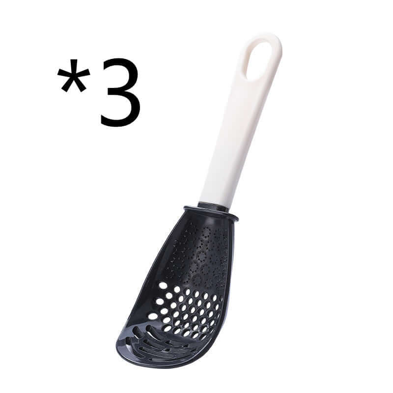 Perforated black cooking spoon with white handle