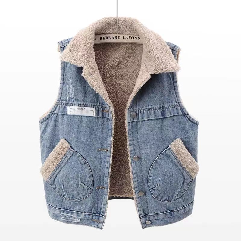 Denim vest with beige fleece lining on a white background