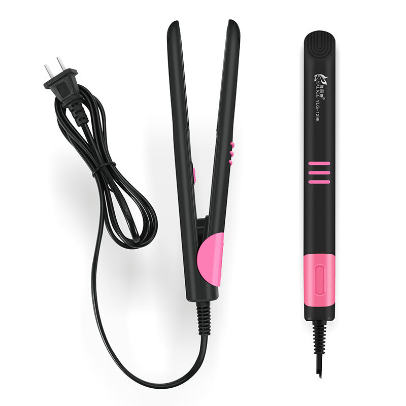 Black and pink hair straightener with cord on a white background