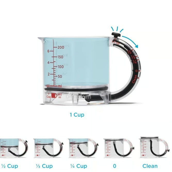 Clear measuring cup with black handle and measurement markings on a white background