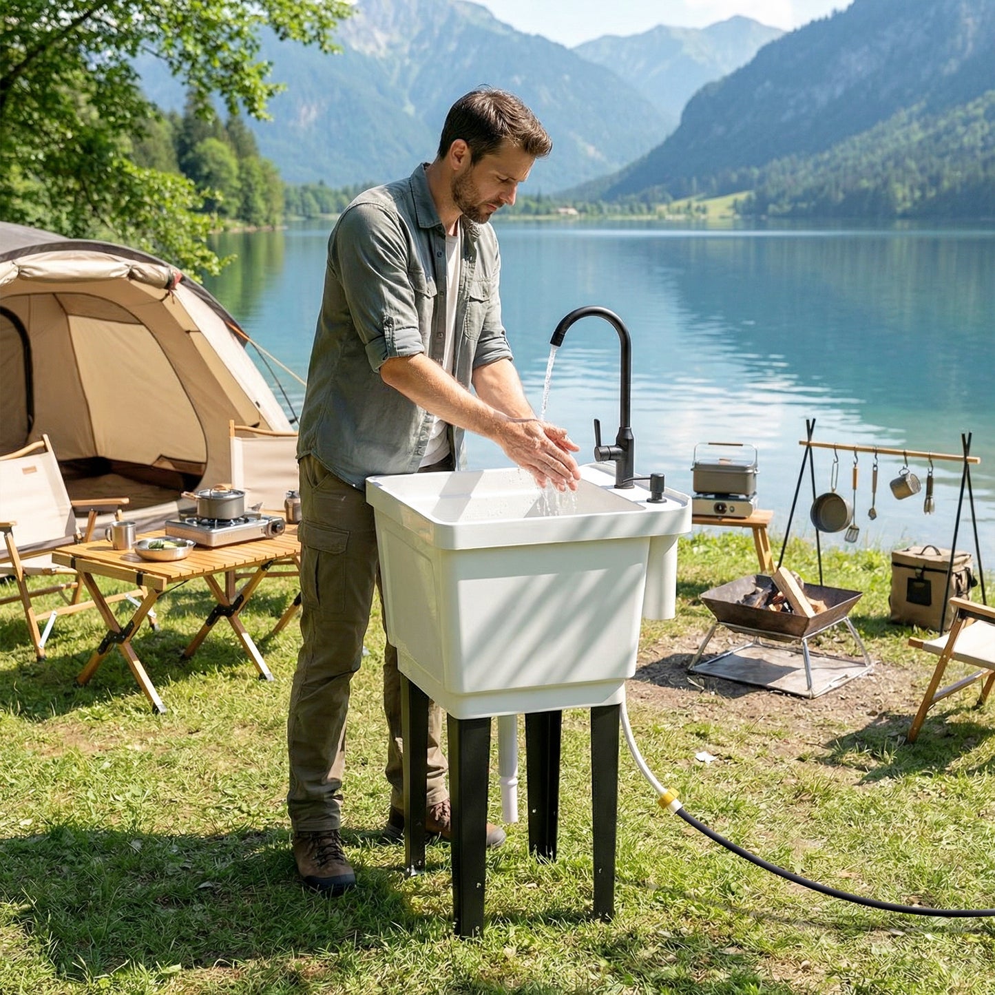 White portable utility sink with black faucet being used for hand washing outdoors
