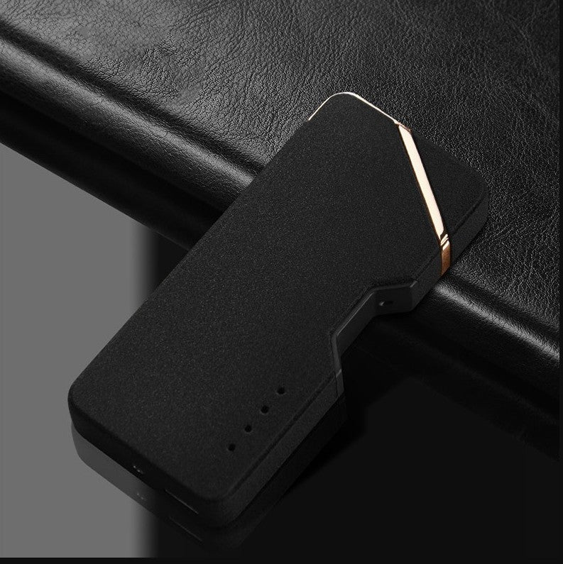 Black phone case with gold accent on a black surface