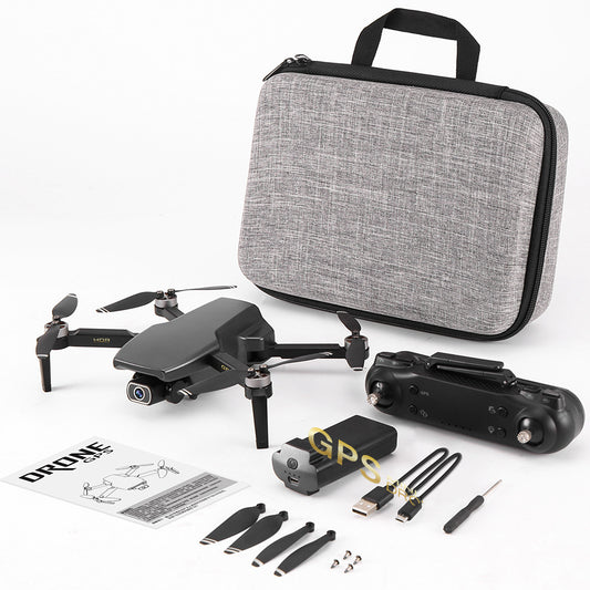 Drone with accessories and a carrying case on a white background