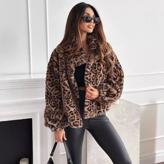 Woman wearing a leopard print coat in a modern interior setting