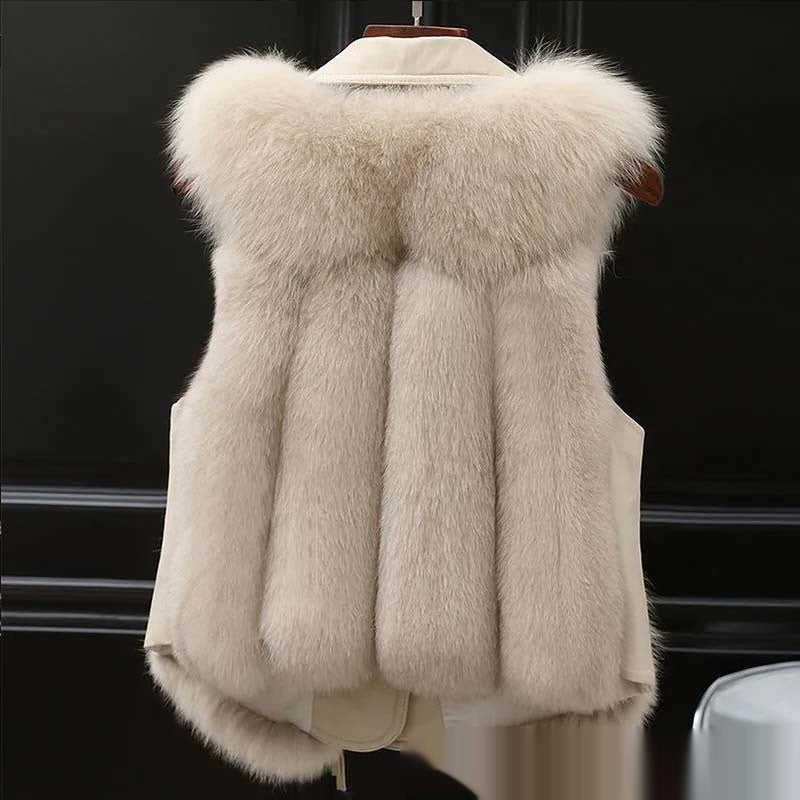 Beige fur vest on a black background