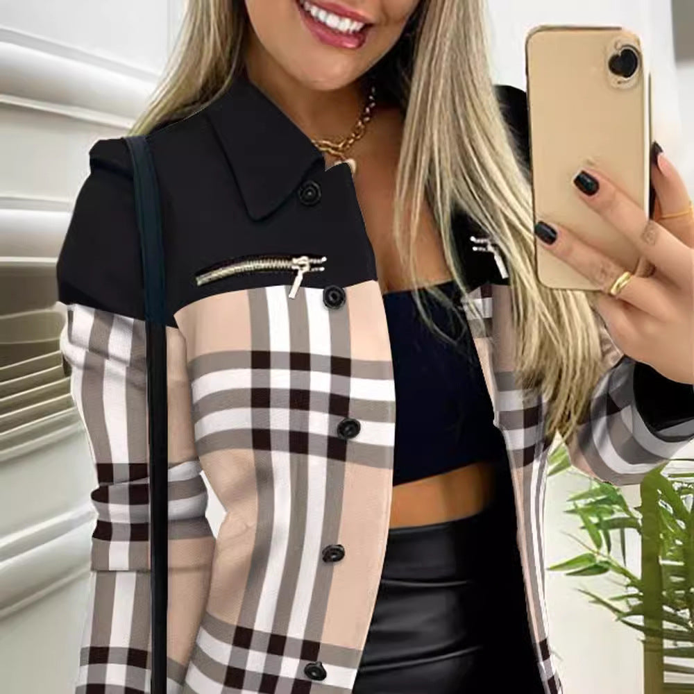 Person wearing a black and plaid jacket