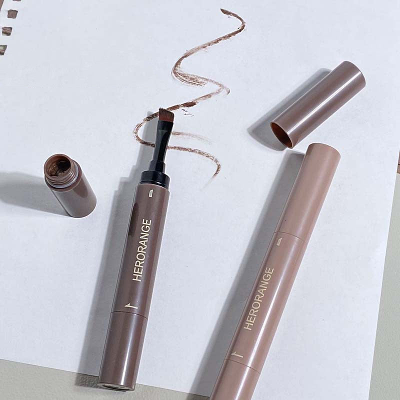 Herorange makeup product with applicator on a light background