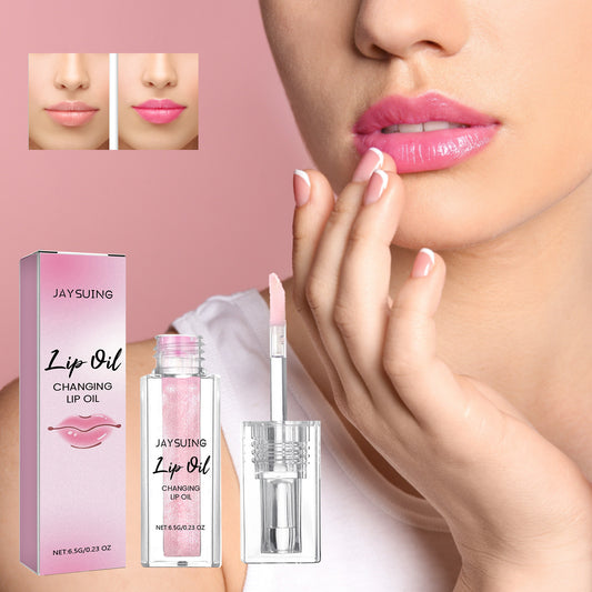 Lip oil product with packaging and a woman applying it on her lips.