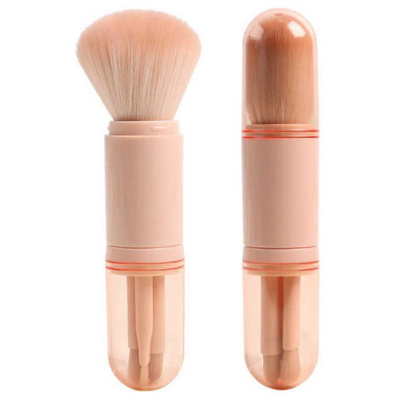 Two makeup brushes with pink handles on a white background
