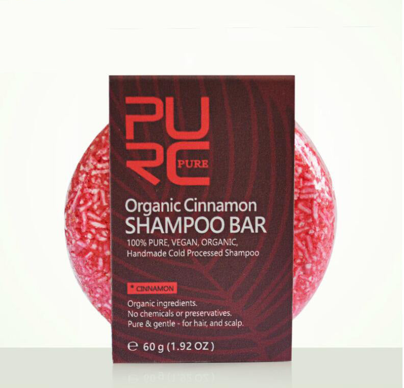 Red shampoo bar with 'PURE' packaging on a white background