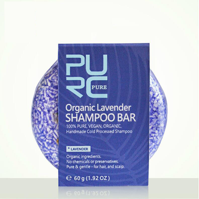 Organic lavender shampoo bar with packaging on a white background