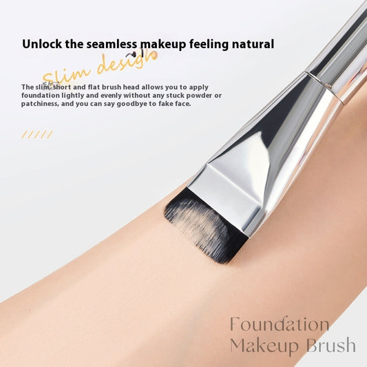 Foundation makeup brush with text on a light background