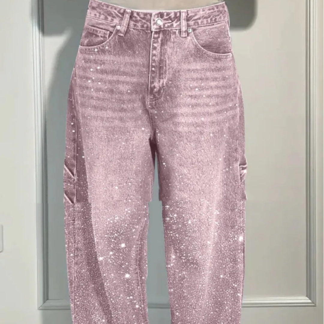 Pink glittery jeans on a light gray background