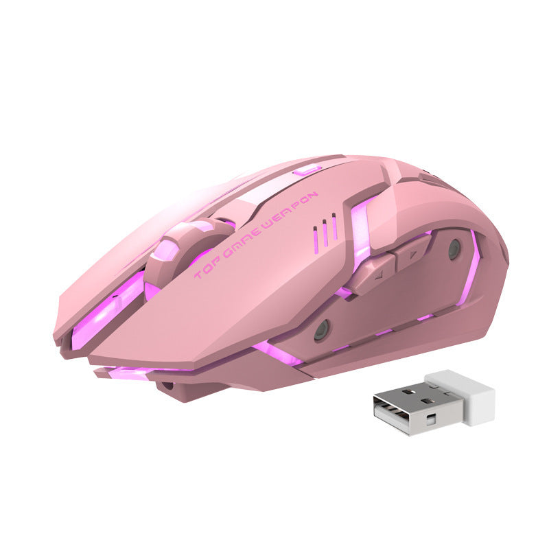 Wireless gaming mouse with blue LED lights, placed on a laptop, with a charging USB dongle beside it.