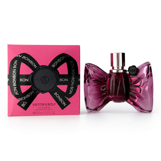Purple bow-shaped women’s EDP spray tester with metallic cap and pink box
