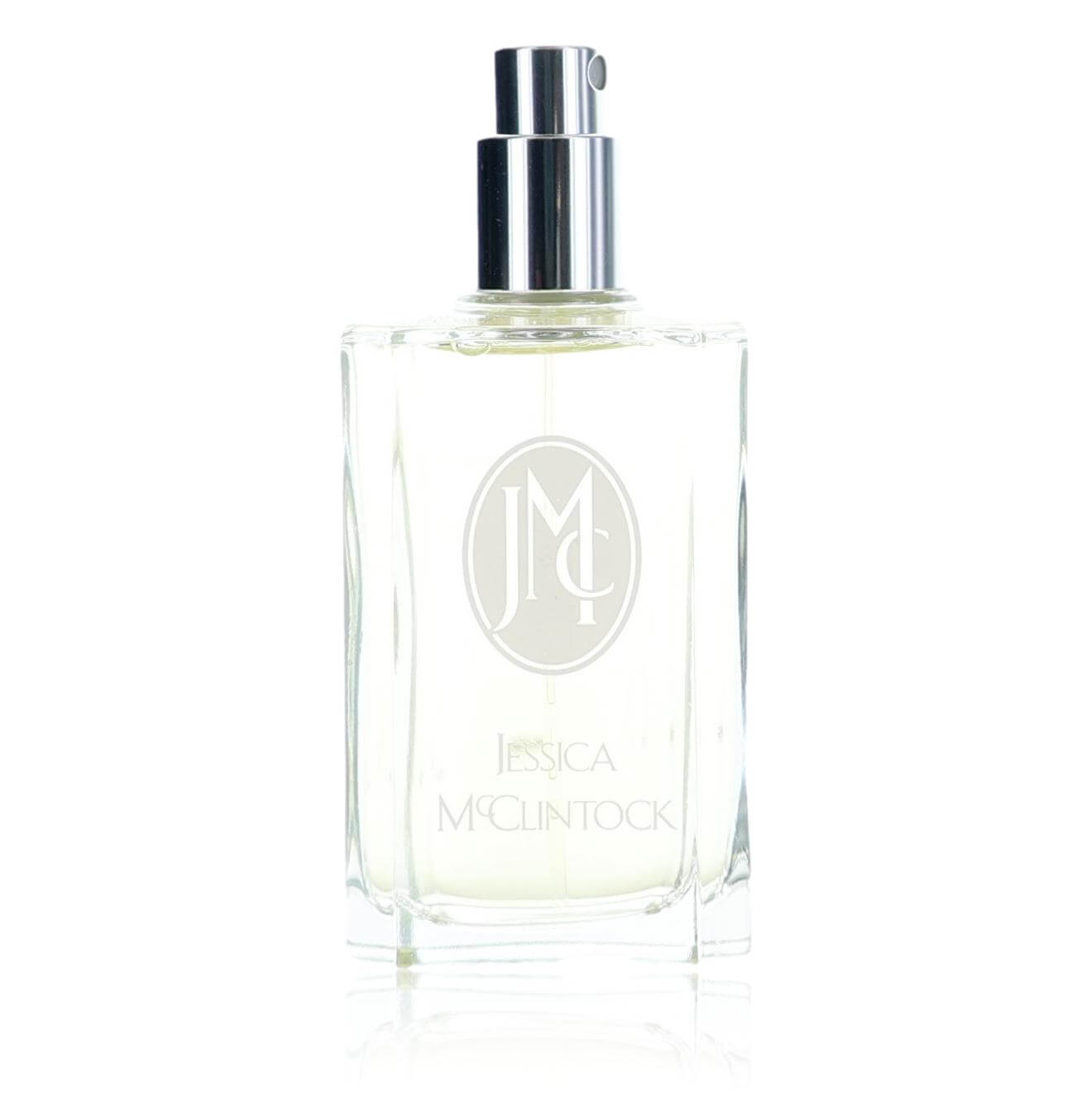 Women's eau de parfum spray bottle with clear glass and silver cap