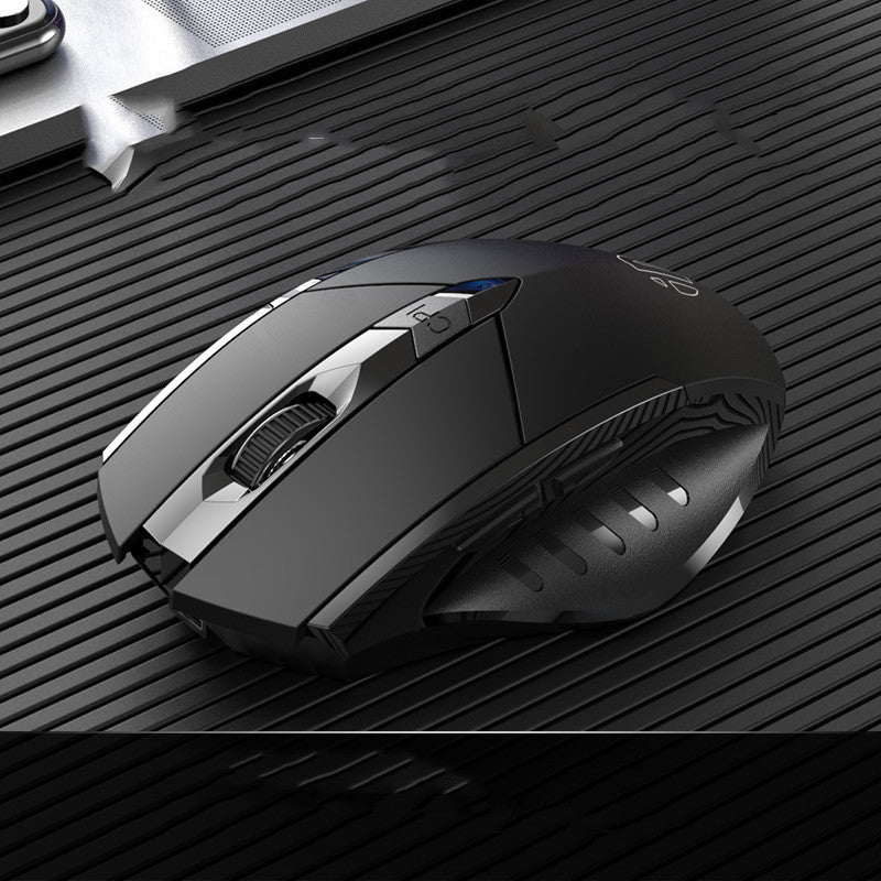 Black gaming mouse on a textured black surface
