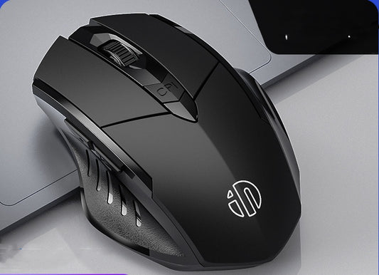 Black gaming mouse with a logo on a light gray background