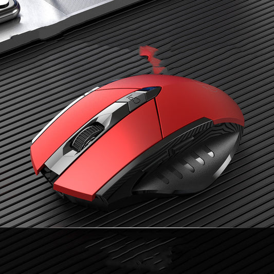 Red gaming mouse on a textured black surface