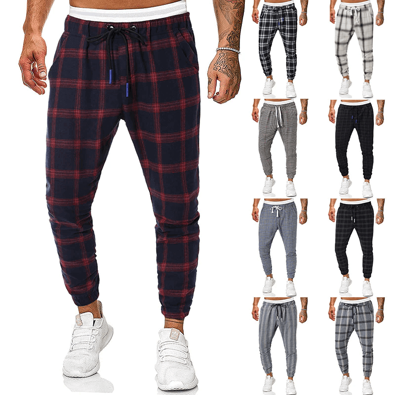 A display of tailored chinos, denim jeans, and knit joggers from the Stylish Comfortable Men's Bottoms collection