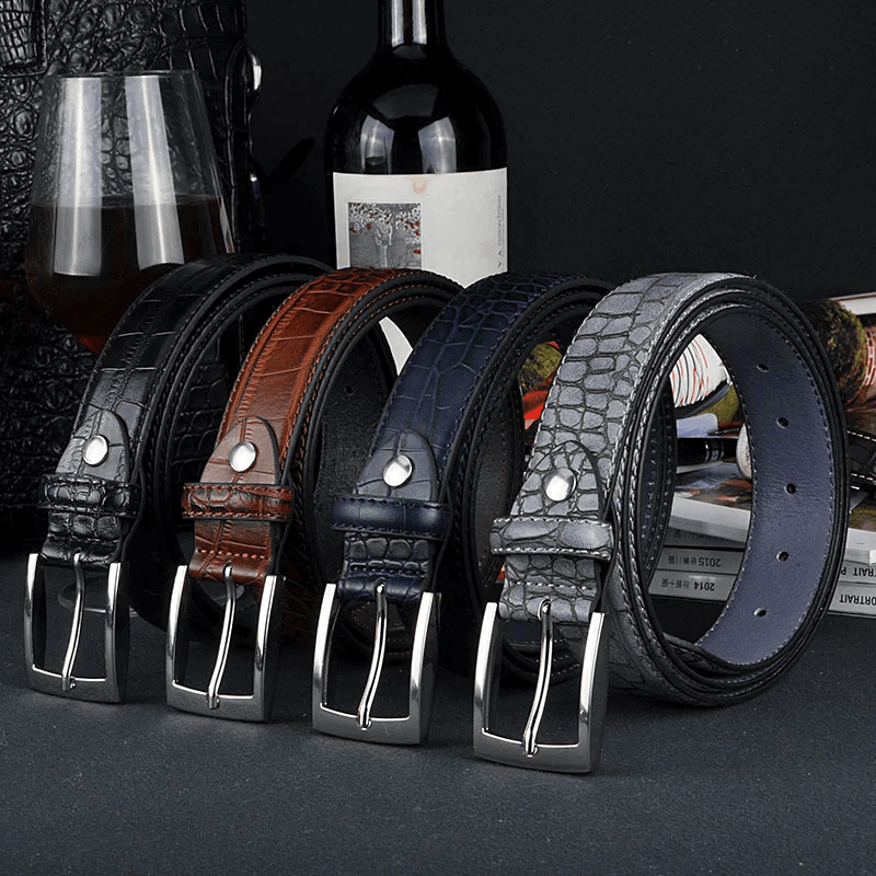 A display of leather dress belts and casual straps with metal buckles from the Men's Fashion Belts collection