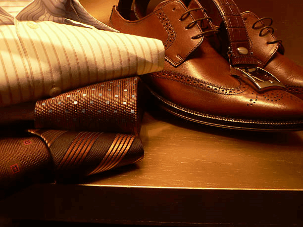 A curated display of leather dress shoes, sneakers, and boots from the Men's Shoes Collection