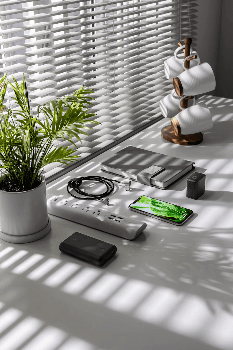 A display of essential Phone Accessories, including durable cases, chargers, and grips