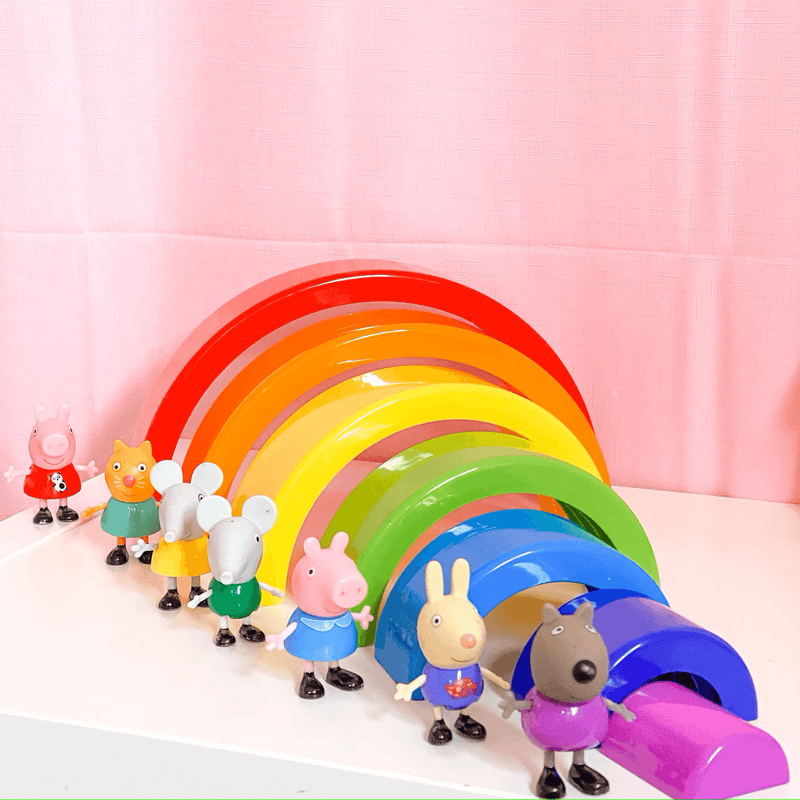 A curated display of wooden puzzles, soft dolls, and educational blocks from the Premium Baby and Kids Toys collection
