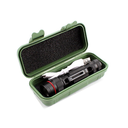Green hard case with foam insert holding a black flashlight and white USB cable.