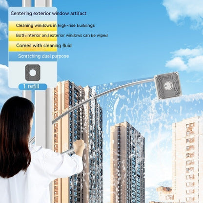 Person cleaning windows of high-rise buildings with a window cleaning tool against a blue sky.