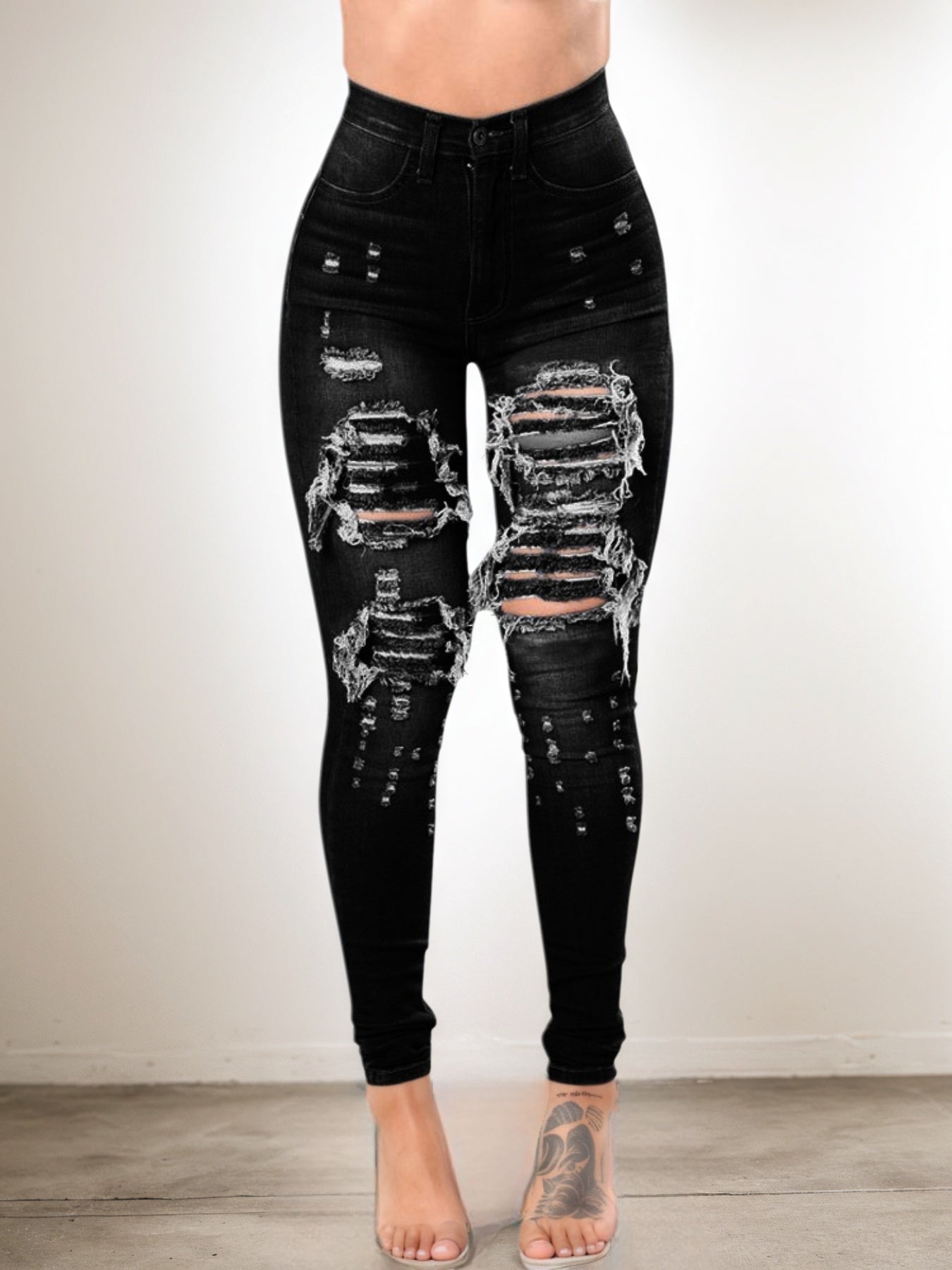 Black ripped skinny jeans, high-waist with large knee and thigh distress
