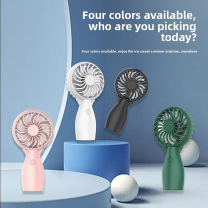 Handheld fan display in pink, white, dark gray, and green