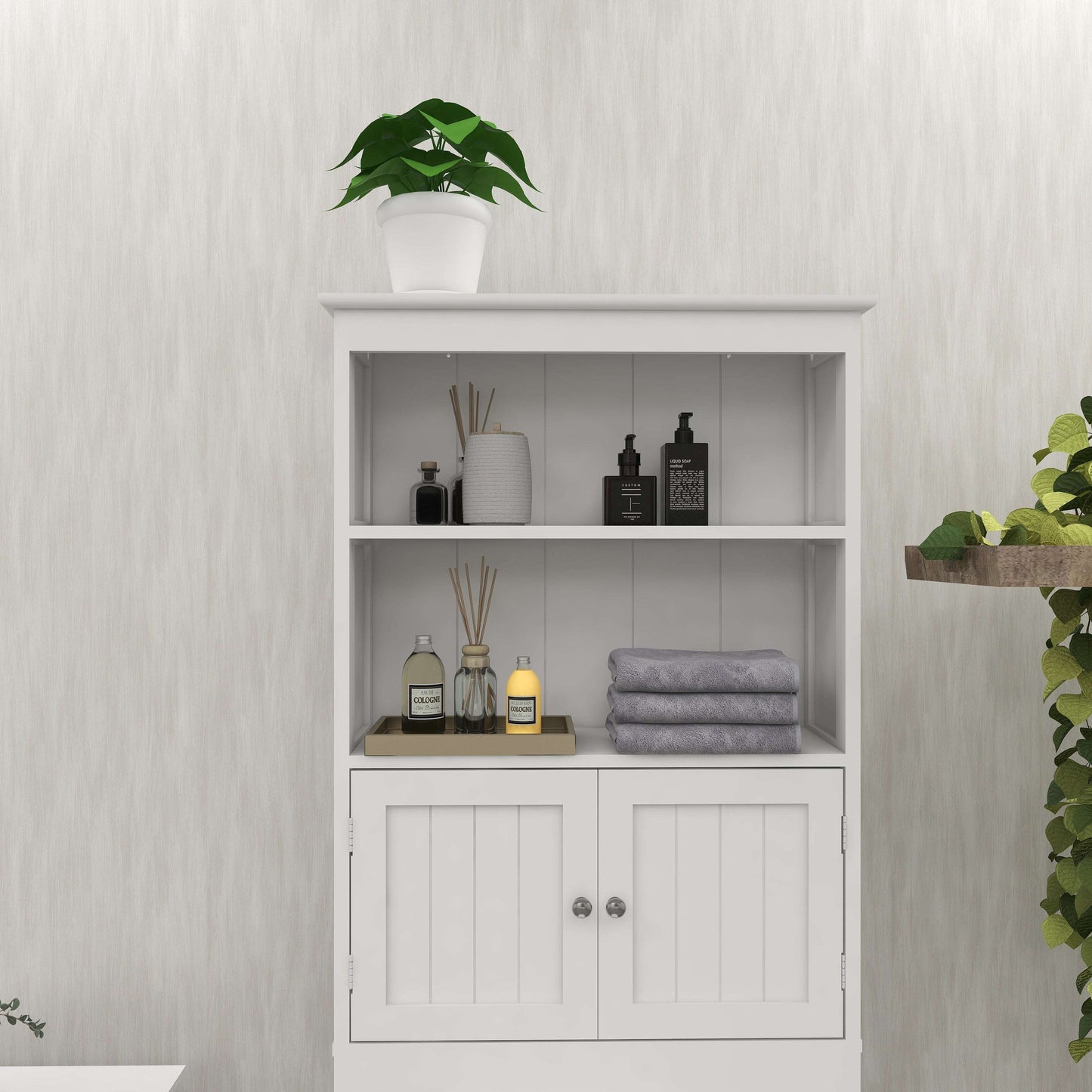 White bathroom storage rack over the toilet with open shelf and two cabinet doors