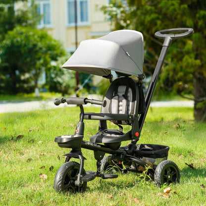 Kids 3-wheel tricycle stroller with light grey canopy and black seat, three-wheel base.