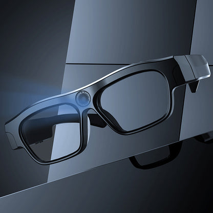 Black 3D glasses on a reflective surface with a dark background