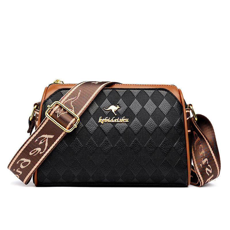 Rhombus leather shoulder messenger bag in black with diamond texture, tan strap, gold logo
