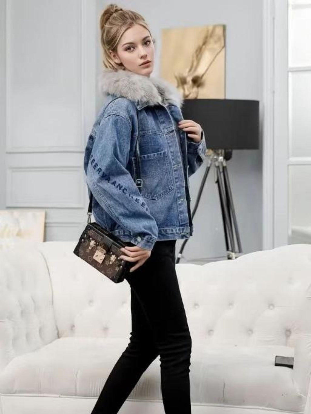 Light blue oversized denim jacket with faux fur collar, button front, side pockets