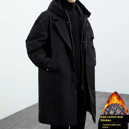 Black mid-length hooded trench coat with zip and button front, layered lapels