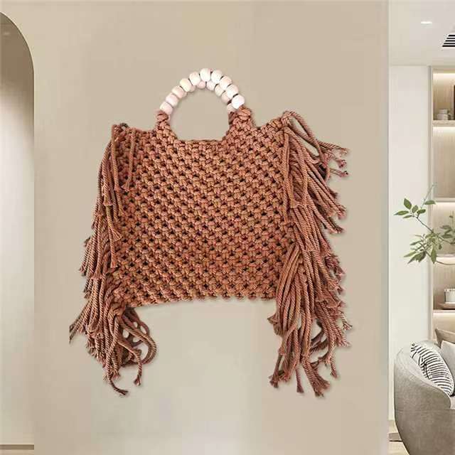 Woven mini crossbody bag with beaded handle and fringe tassels, light brown crochet