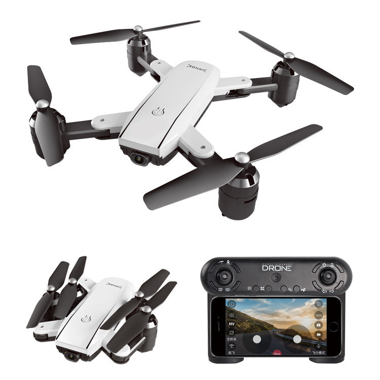 White folding quadcopter drone with four propellers and remote controller screen