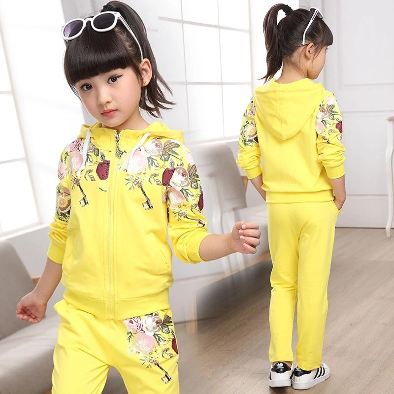 Yellow kids zip-up tracksuit set with floral sleeves and matching joggers, hoodie