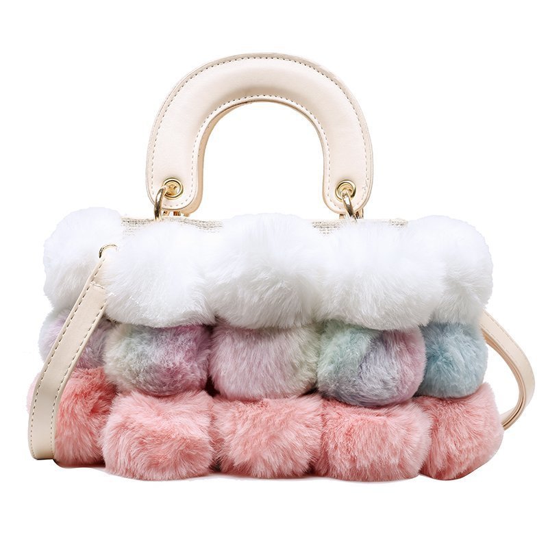Plush shoulder bag with cream handle and pastel layered plush in white, pink, and gray