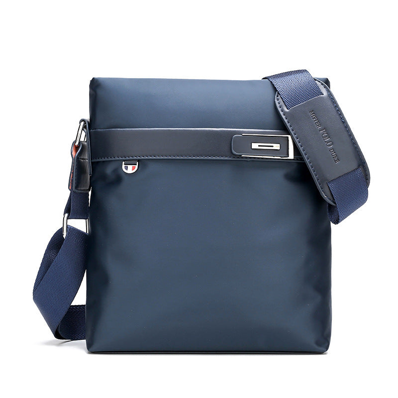 Blue A4 file bag briefcase with front clasp and adjustable crossbody strap detail