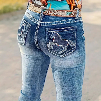 Light blue straight-leg jeans with prominent embroidered back-pocket graphic