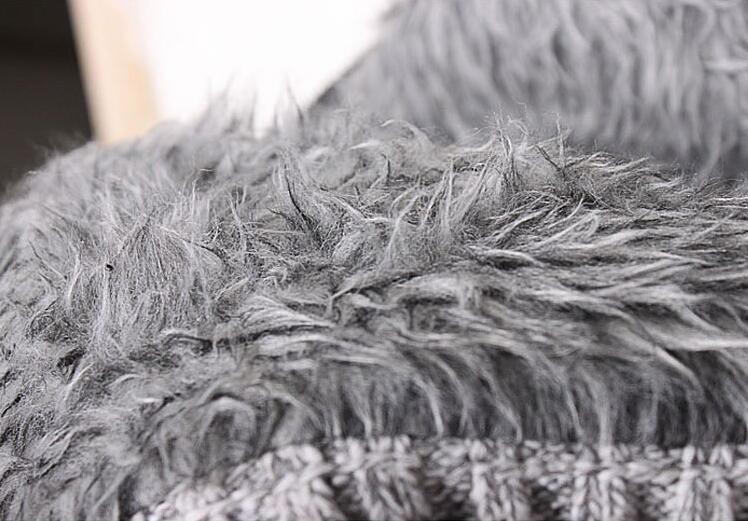 Close-up of a textured gray fabric surface