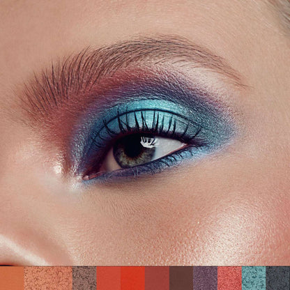 Close-up of a woman's eye with colorful makeup, including blue and purple shades.