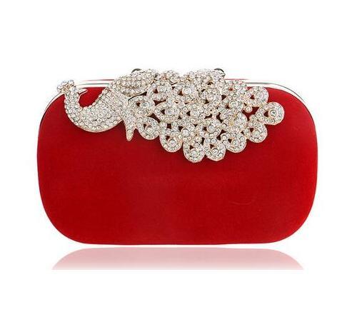 Red velvet oval clutch bag with silver rhinestone baroque clasp frame