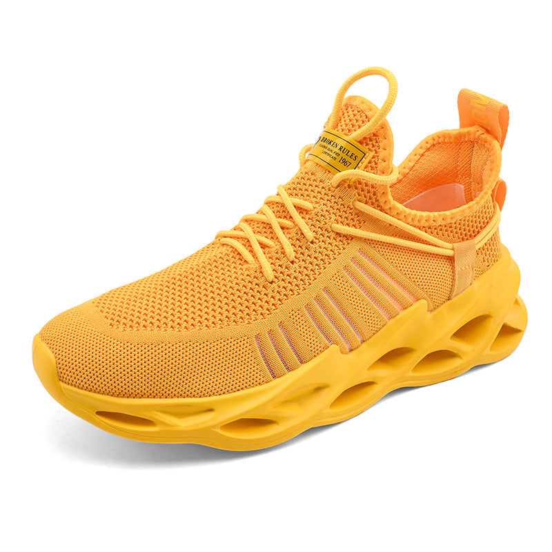 Breathable sneakers, orange knit upper with laces and chunky ventilated sole